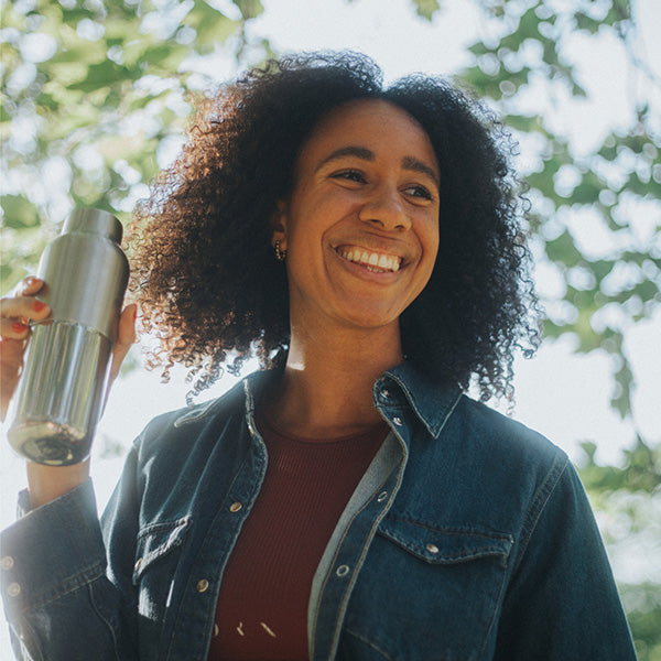 bring-your-own-party-kit-tumblers-and-cocktails-d6 16oz_rise_reflect_woman_smile_square.jpg