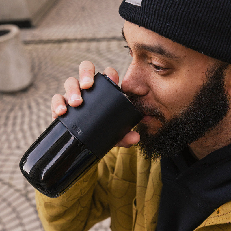 16oz-rise-tumbler-k6 16oz_rise_tumbler_black_man_drink_square.jpg