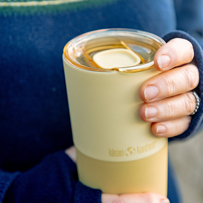 16oz-rise-tumbler-k6 16oz_rise_tumbler_wax_yellow_closeup_hand_lid_square.jpg